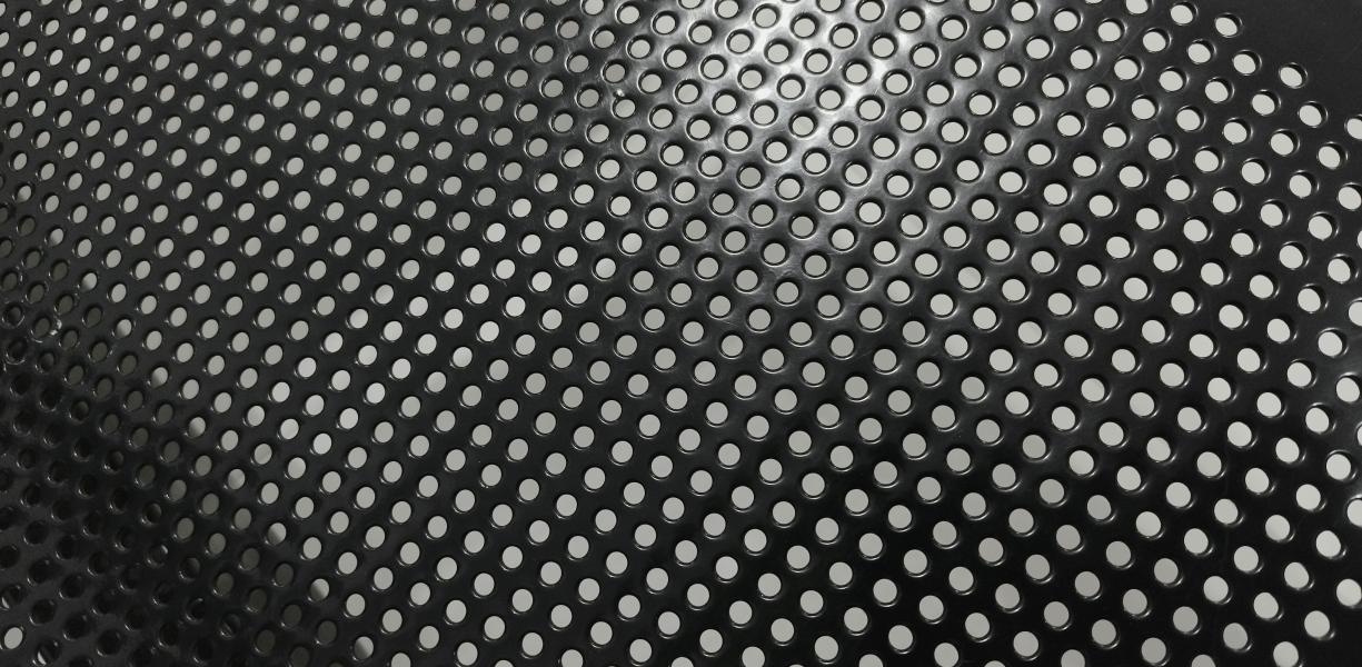 Perforated and punched aluminium panel (image: Shutterstock.com).